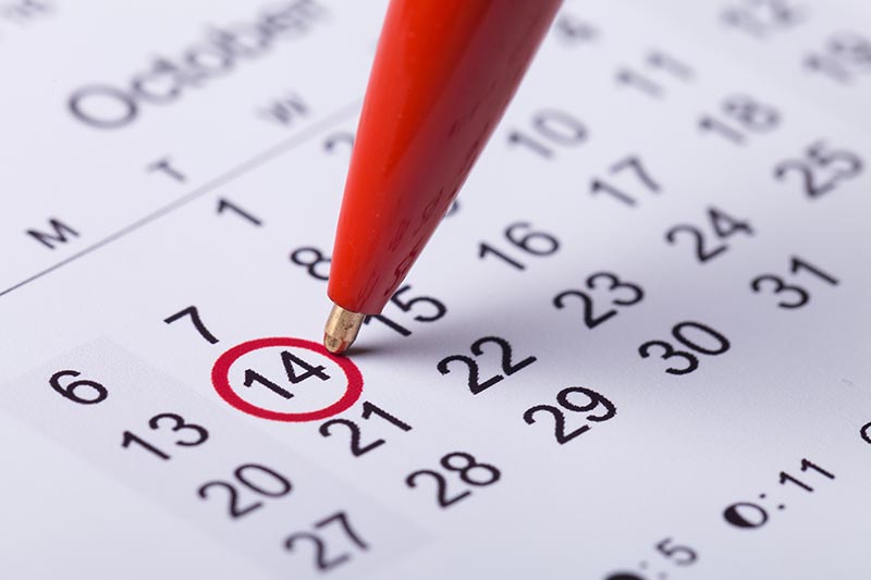 Pen marking on a calendar the date home inspection services were preformed 
