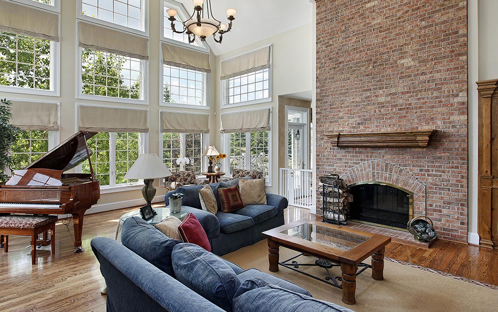 Large furnished family room seen during a home inspection